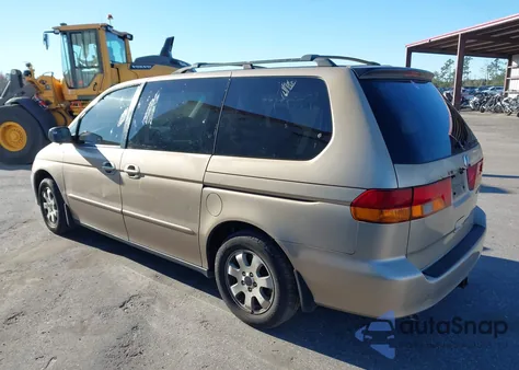 2002 Honda Odyssey Ex z USA, uszkodzony, nr VIN 2HKRL18602H570373
